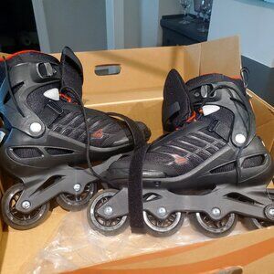 Men's size 9 Zetrablade inline rollerblades.